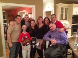 Chris Michienzie and family with Sam Berns